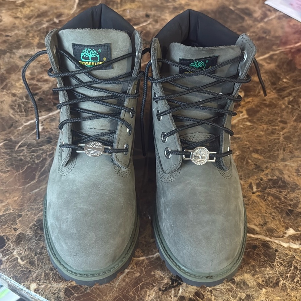 Slightly worn kid timberland boots